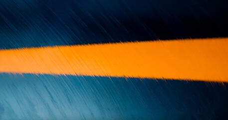 Blue and orange colors paper texture background. Blur texture background. Place for text. Three tones. Abstract rain lines.