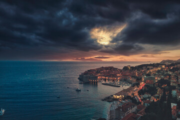 Travel to Croatia. Aerial night image of summer sky. Popular tourist destination in Hrvatska, Dubrovnik has hundreds of tourists to take pictures of the medieval fortification that has become iconic