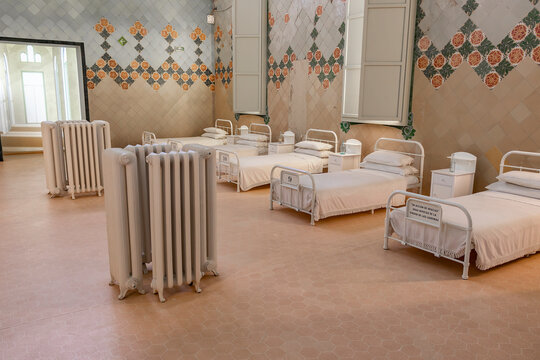 Barcelona, Spain - September 19, 2021: Ancient hospital patients room in Sant Pau hospital in Barcelona with beds
