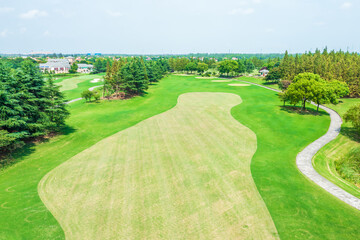Fototapeta premium Aerial view of green lawn on golf course.