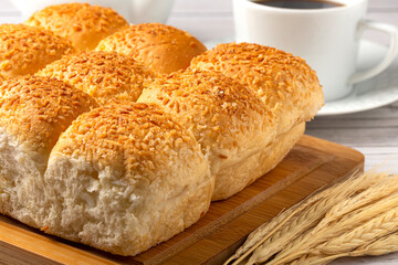 Coconut bread on the wooden table.