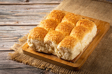 Coconut bread on the wooden table.