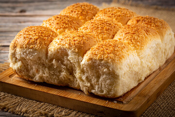 Coconut bread on the wooden table.