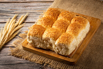 Coconut bread on the wooden table.