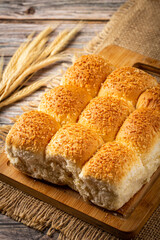 Coconut bread on the wooden table.