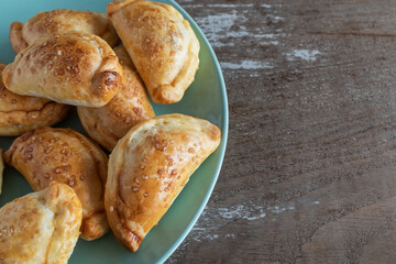 Mini empanadas stuffed with apple compote and cinnamon