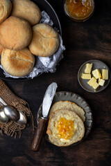 breakfast of english muffins with butter and jam