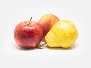 apple, pear and peach isolated on white