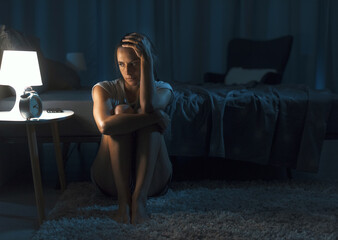 Depressed woman suffering from insomnia