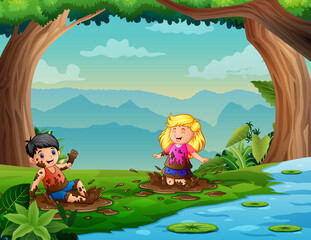 Naklejka premium Two children have fun playing in the mud near the river