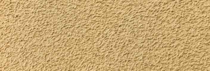 Panorama of Sand texture. Sandy beach for background. Top view. Natural sand stone texture background. sand on the beach as background. Wavy sand background for summer designs