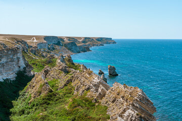 Fototapeta na wymiar The Dzhangul landslide tract on the western coast of Crimea. Picturesque seascape with azure water