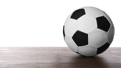 Fototapeta na wymiar Football ball on wooden table against white background. Space for text
