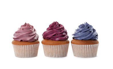 Different delicious colorful cupcakes on white background