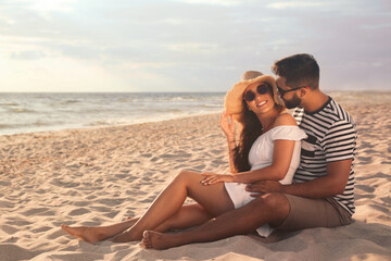 Lovely couple spending time together on beach