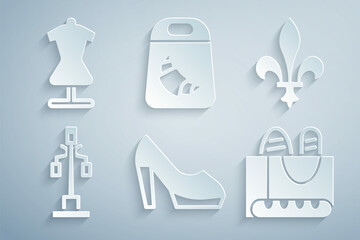 Set Woman shoe, Fleur De Lys, Street light, French baguette bread, Croissant package and Mannequin icon. Vector