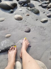 feet on the beach