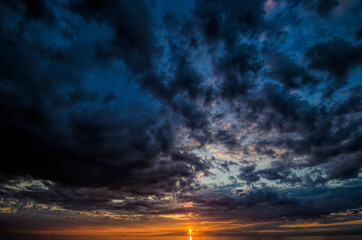 Beautiful bright sunset over the water. Water landscape 
