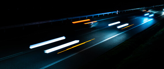 lights of moving cars at night. long exposure