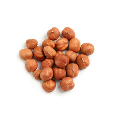 Heap of tasty hazelnuts on white background, top view
