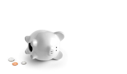 fallen piggy bank with US coins coming out, white piggy with white background bottom left corner...