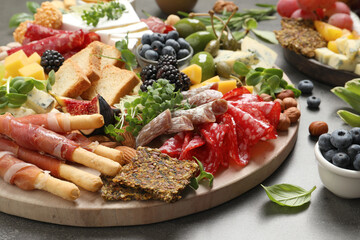 Many different tasty appetizers on table, closeup