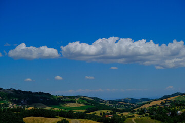 Fototapeta na wymiar landscape with blue sky and clouds rural landscape with field and hills. Natural background