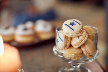 Macaroons with star of David decoration during Hanukkah.