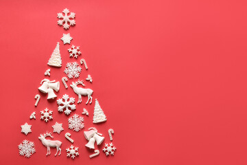 Fototapeta na wymiar Christmas tree of different shape mold on red background. New Year or Merry Christmas greeting card. Xmas holiday.