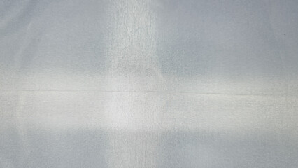 The White fabric background. White material background.