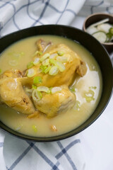 steaming samgyetang, chicken soup with ginseng korean food.