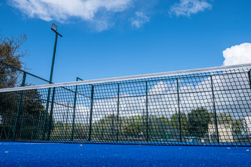 Net of an empty paddle court