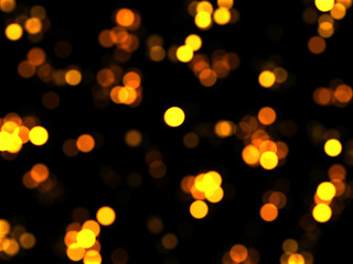 Defocused golden lights on a dark background. Christmas glowing background.