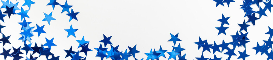 banner of Christmas frame with blue star confetti. Holiday background for New Year on white