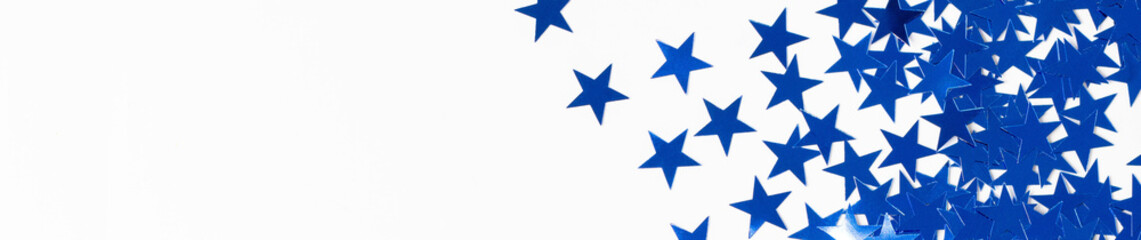 banner of Christmas border with blue star confetti. Holiday background for New Year on white