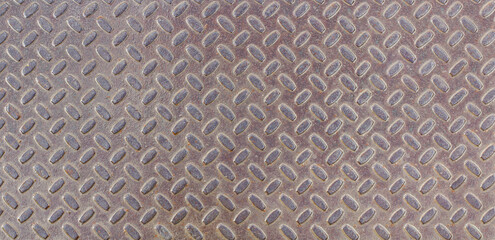 Texture of an industrial iron sheet with rust close-up, grunge industrial pattern.