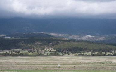 Fototapeta na wymiar clouds over the mountains in Colorado Springs