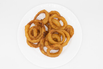 Overhead View of Delicious Onion Rings on a White Plate