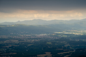 panoramic town of la garriga with summer storm black clouds, catalonia spain