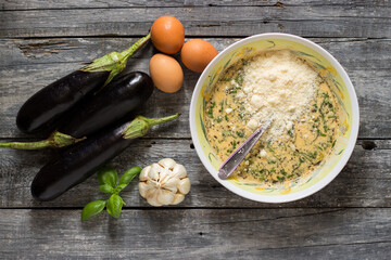 Traditional country stuffed eggplants with egg, cheese, garlic, parsley and oregano filling