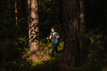 girl walking in the woods