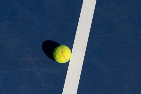 Concrete Blue Tennis Court With Ball