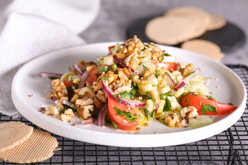 salad of celery tomatoes red onions and nuts