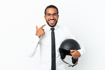 Young business latin man with a motorcycle helmet isolated on white background giving a thumbs up gesture