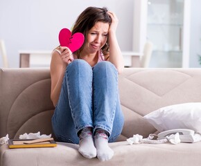 Broken woman heart in relationship concept