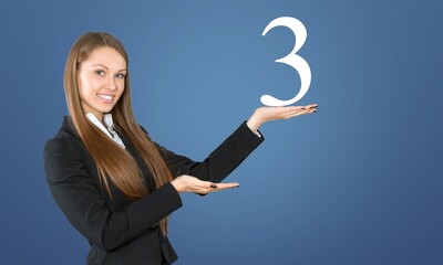Young beautiful woman showing number 3 three