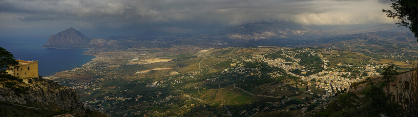 Sicily panoramic sea and valley view at the sunset on a cloudy day