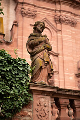 Fototapeta na wymiar Amorbach Benedictine abbey church sandstone statue