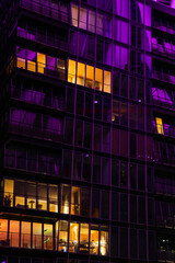glass building by nightfall