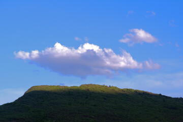 Fototapeta premium clouds over the mountain,nature,green, summer, tree, view, blue, forest, scenery,sky, landscape,